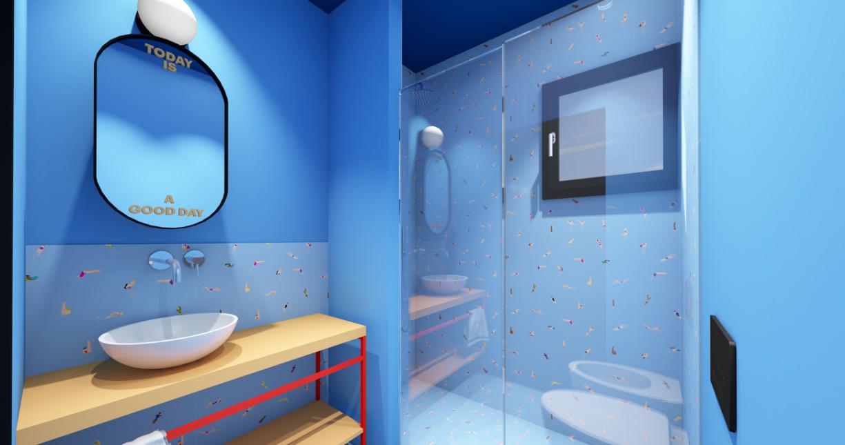 Bagno moderno blu con specchio, lavabo ovale e doccia con decorazioni colorate.